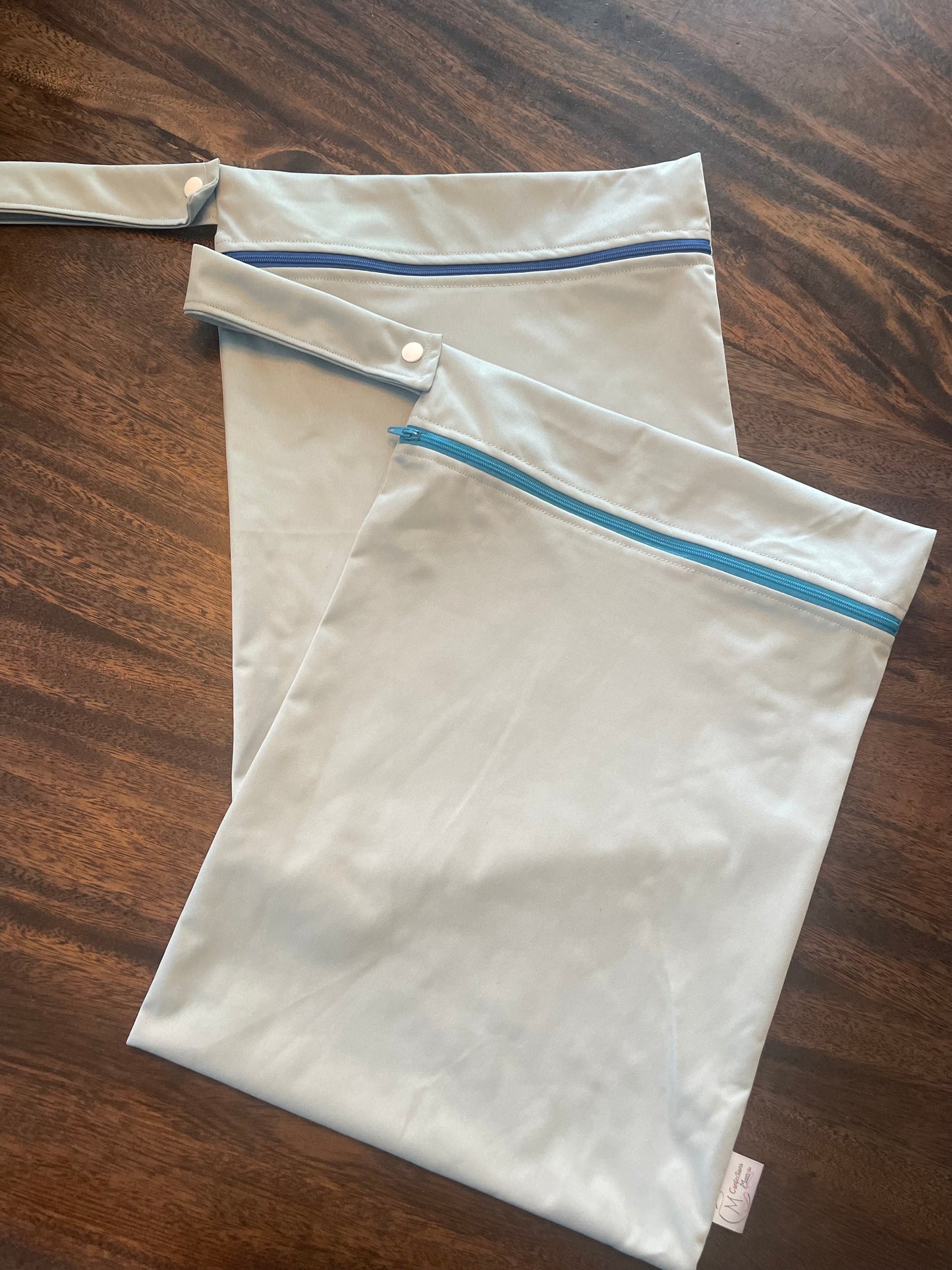Wetbag bleu pâle en rabais