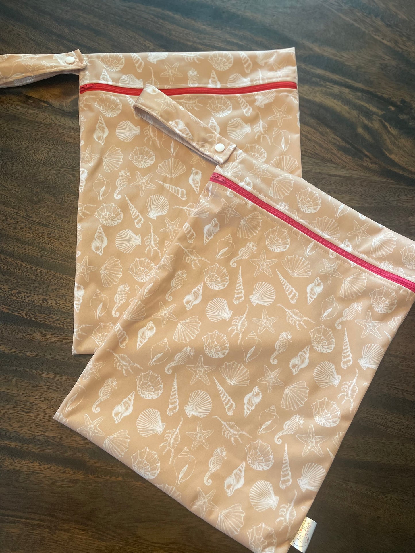 Wetbag coquillage en rabais