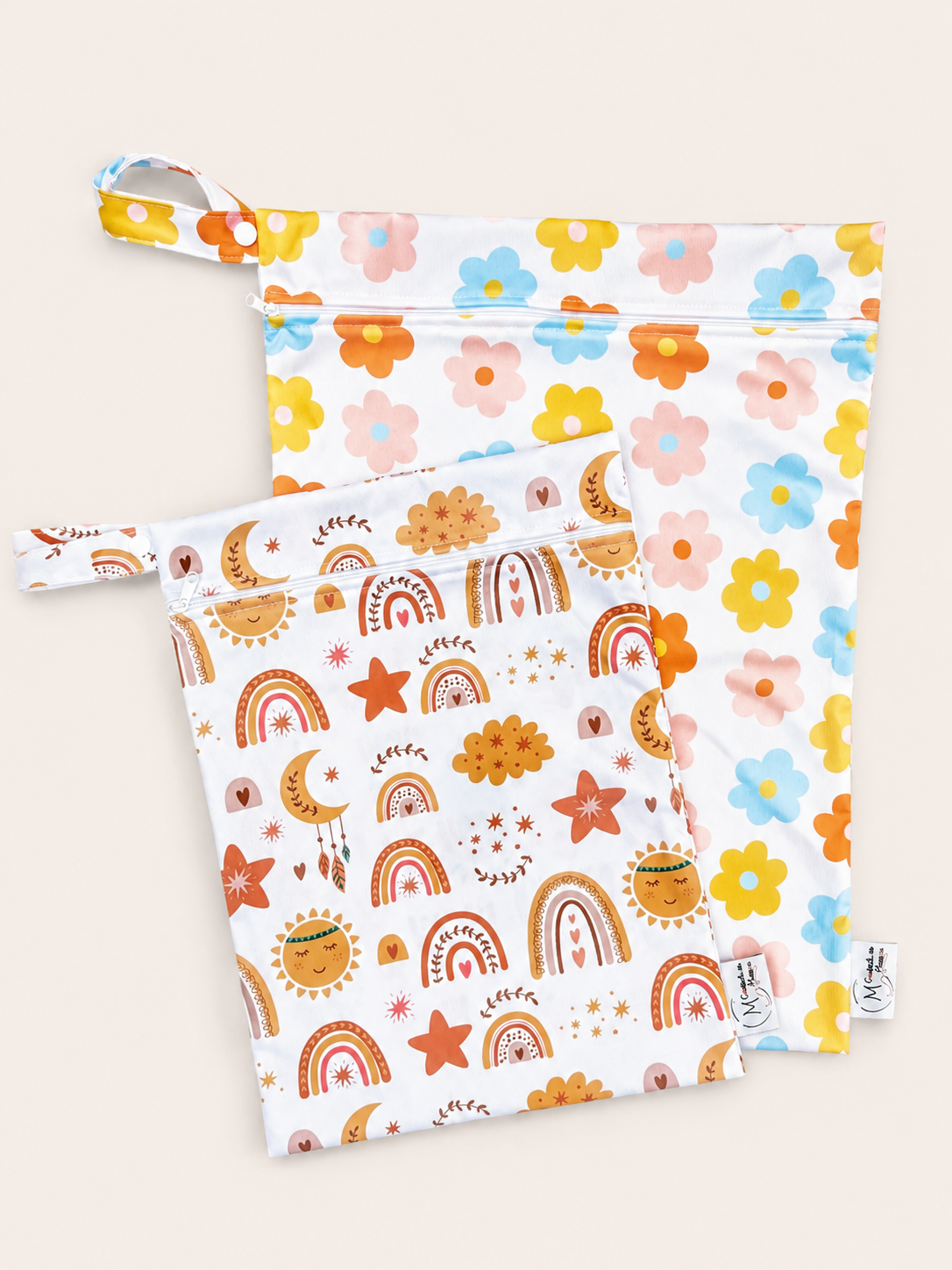 Wetbags fleurs/arc en ciel à rabais