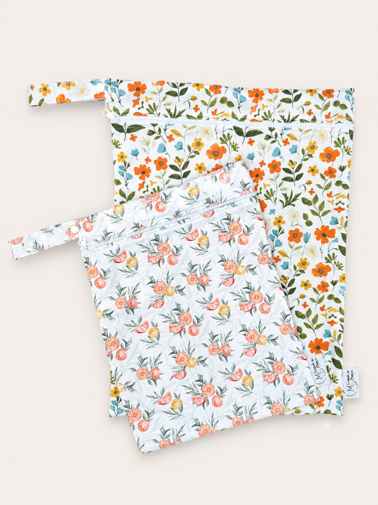 Wetbags fleurs/agrumes à rabais